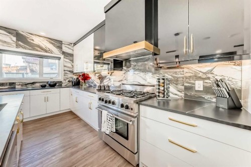 630 Rocky Ridge View Nw, Calgary, AB - Indoor Photo Showing Kitchen With Upgraded Kitchen