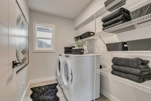 142 Belmont Passage Sw, Calgary, AB - Indoor Photo Showing Laundry Room