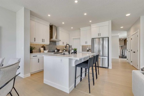 142 Belmont Passage Sw, Calgary, AB - Indoor Photo Showing Kitchen With Upgraded Kitchen