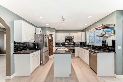 668 Scimitar Bay Nw, Calgary, AB - Indoor Photo Showing Kitchen With Double Sink