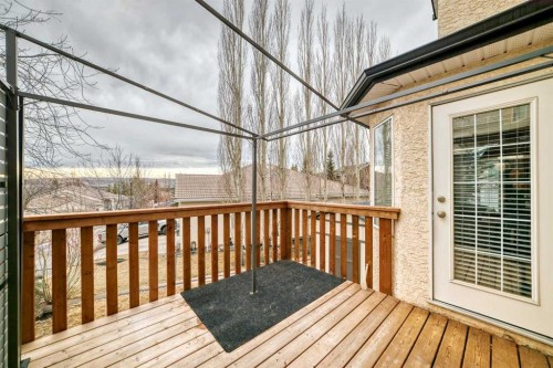 668 Scimitar Bay Nw, Calgary, AB - Outdoor With Deck Patio Veranda With Exterior