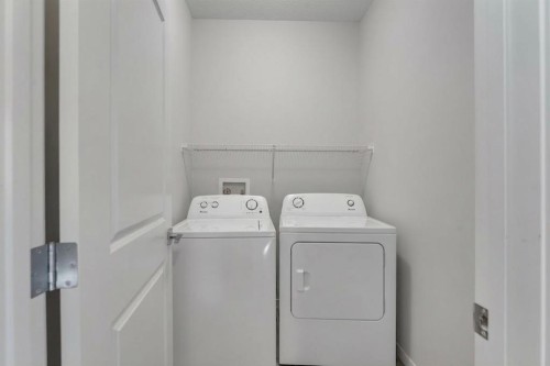 1162 Cornerstone Boulevard Ne, Calgary, AB - Indoor Photo Showing Laundry Room