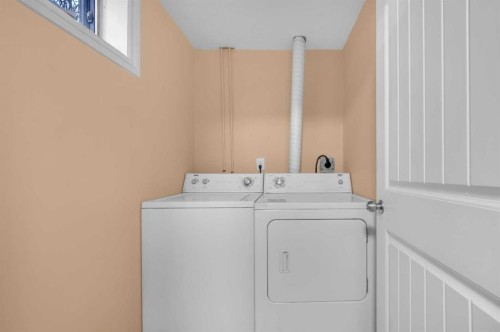 48 Faldale Close Ne, Calgary, AB - Indoor Photo Showing Laundry Room