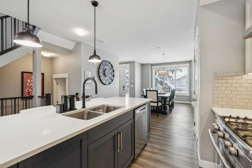 4936 20 Avenue Nw, Calgary, AB - Indoor Photo Showing Kitchen With Double Sink With Upgraded Kitchen