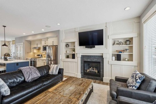 4936 20 Avenue Nw, Calgary, AB - Indoor Photo Showing Living Room With Fireplace