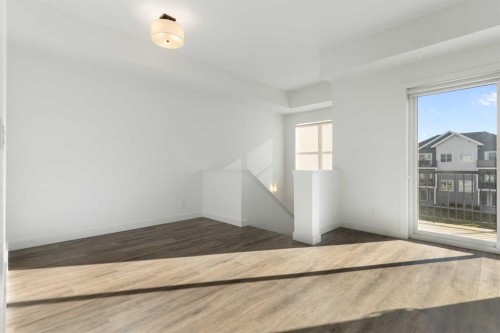 602-24 Rivercrest Drive, Cochrane, AB - Indoor Photo Showing Other Room