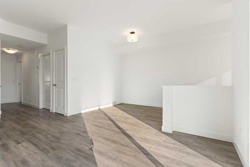 602-24 Rivercrest Drive, Cochrane, AB - Indoor Photo Showing Other Room