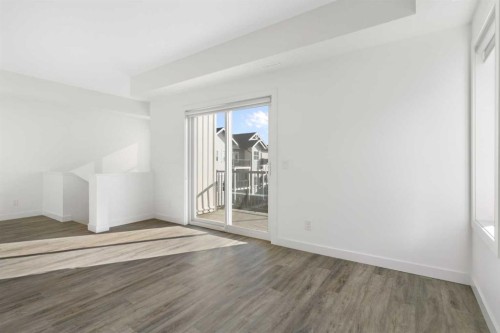 602-24 Rivercrest Drive, Cochrane, AB - Indoor Photo Showing Other Room
