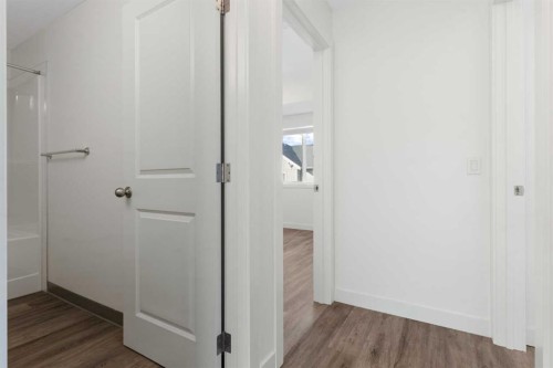 602-24 Rivercrest Drive, Cochrane, AB - Indoor Photo Showing Other Room