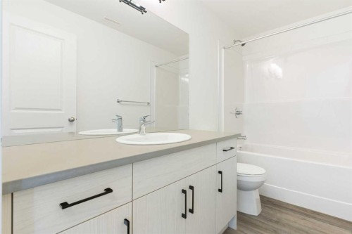 602-24 Rivercrest Drive, Cochrane, AB - Indoor Photo Showing Bathroom