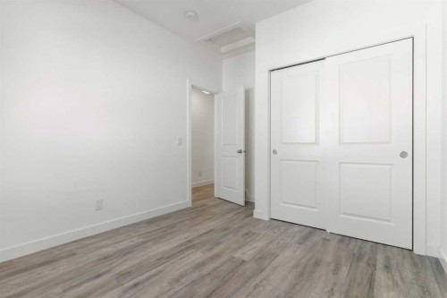 602-24 Rivercrest Drive, Cochrane, AB - Indoor Photo Showing Other Room