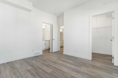 602-24 Rivercrest Drive, Cochrane, AB - Indoor Photo Showing Other Room