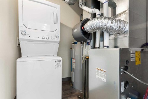 602-24 Rivercrest Drive, Cochrane, AB - Indoor Photo Showing Laundry Room
