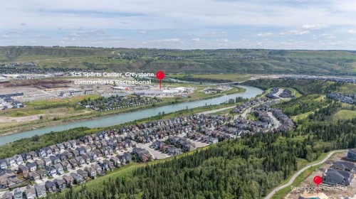 602-24 Rivercrest Drive, Cochrane, AB - Outdoor With Body Of Water With View