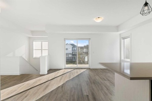 602-24 Rivercrest Drive, Cochrane, AB - Indoor Photo Showing Other Room