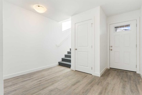 602-24 Rivercrest Drive, Cochrane, AB - Indoor Photo Showing Other Room