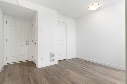 602-24 Rivercrest Drive, Cochrane, AB - Indoor Photo Showing Other Room