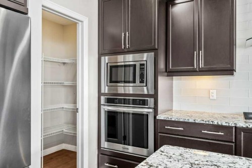 54 Auburn Crest Way Se, Calgary, AB - Indoor Photo Showing Kitchen With Upgraded Kitchen
