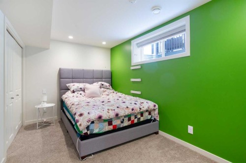 31 Sunset Link, Cochrane, AB - Indoor Photo Showing Bedroom