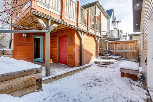 31 Sunset Link, Cochrane, AB - Outdoor With Deck Patio Veranda With Exterior