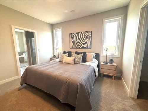 30 Bridges Way, Langdon, AB - Indoor Photo Showing Bedroom