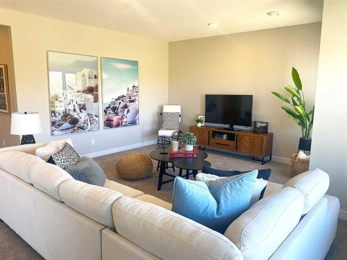 30 Bridges Way, Langdon, AB - Indoor Photo Showing Living Room