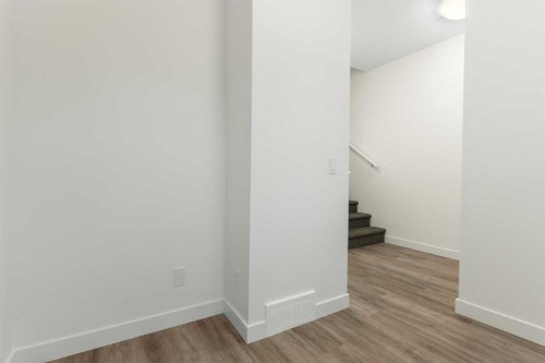 103-24 Rivercrest Drive, Cochrane, AB - Indoor Photo Showing Other Room