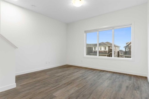 103-24 Rivercrest Drive, Cochrane, AB - Indoor Photo Showing Other Room