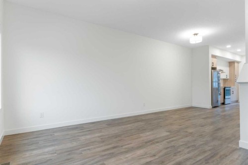 103-24 Rivercrest Drive, Cochrane, AB - Indoor Photo Showing Other Room