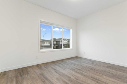 103-24 Rivercrest Drive, Cochrane, AB - Indoor Photo Showing Other Room