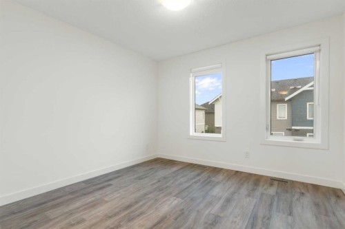 103-24 Rivercrest Drive, Cochrane, AB - Indoor Photo Showing Other Room