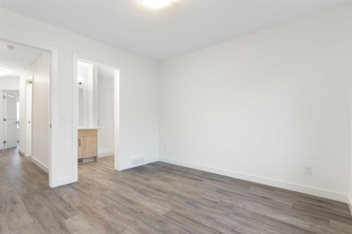 103-24 Rivercrest Drive, Cochrane, AB - Indoor Photo Showing Other Room
