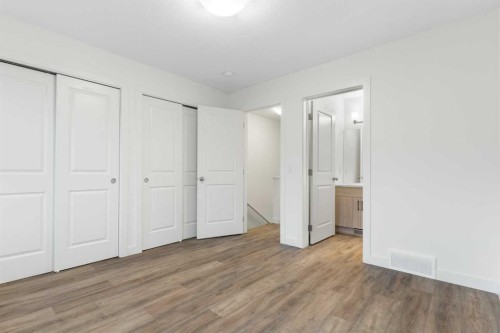 103-24 Rivercrest Drive, Cochrane, AB - Indoor Photo Showing Other Room