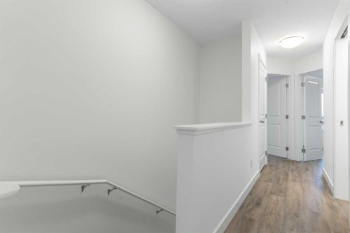 103-24 Rivercrest Drive, Cochrane, AB - Indoor Photo Showing Other Room