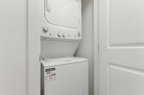 103-24 Rivercrest Drive, Cochrane, AB - Indoor Photo Showing Laundry Room