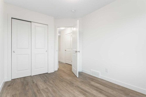 103-24 Rivercrest Drive, Cochrane, AB - Indoor Photo Showing Other Room