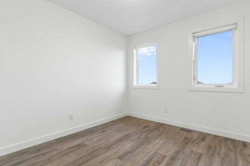 103-24 Rivercrest Drive, Cochrane, AB - Indoor Photo Showing Other Room