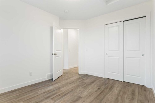 103-24 Rivercrest Drive, Cochrane, AB - Indoor Photo Showing Other Room