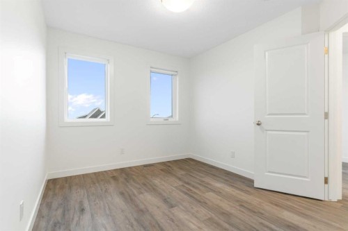 103-24 Rivercrest Drive, Cochrane, AB - Indoor Photo Showing Other Room