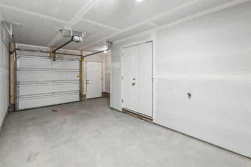 103-24 Rivercrest Drive, Cochrane, AB - Indoor Photo Showing Garage