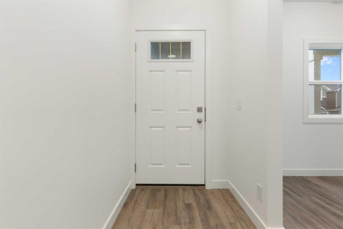103-24 Rivercrest Drive, Cochrane, AB - Indoor Photo Showing Other Room