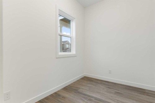 103-24 Rivercrest Drive, Cochrane, AB - Indoor Photo Showing Other Room
