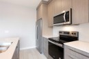 2213-60 Skyview Ranch Road Ne, Calgary, AB  - Indoor Photo Showing Kitchen With Double Sink With Upgraded Kitchen 