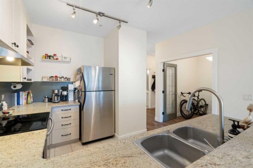 406-830 Centre Avenue Ne, Calgary, AB - Indoor Photo Showing Kitchen With Double Sink