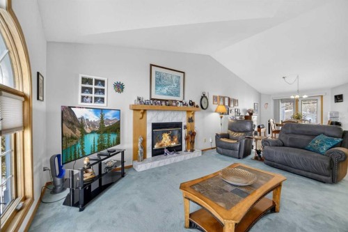 159 Balsam Crescent, Olds, AB - Indoor Photo Showing Living Room With Fireplace