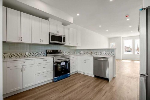 409 Strathcona Circle, Strathmore, AB - Indoor Photo Showing Kitchen With Stainless Steel Kitchen With Upgraded Kitchen