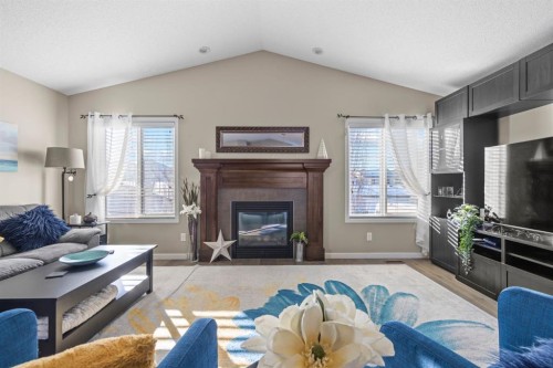 47 Cranford Crescent Se, Calgary, AB - Indoor Photo Showing Living Room With Fireplace