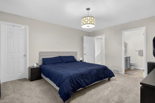 28 Elgin View Se, Calgary, AB - Indoor Photo Showing Bedroom