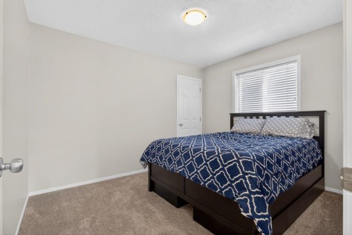 28 Elgin View Se, Calgary, AB - Indoor Photo Showing Bedroom
