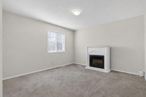 28 Elgin View Se, Calgary, AB - Indoor With Fireplace
